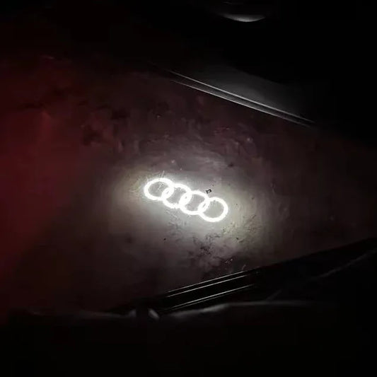 AudiPremiumHDFourRingsLEDCarDoor4PackPuddleLightKitCarDynamics_1 - Car Dynamics 