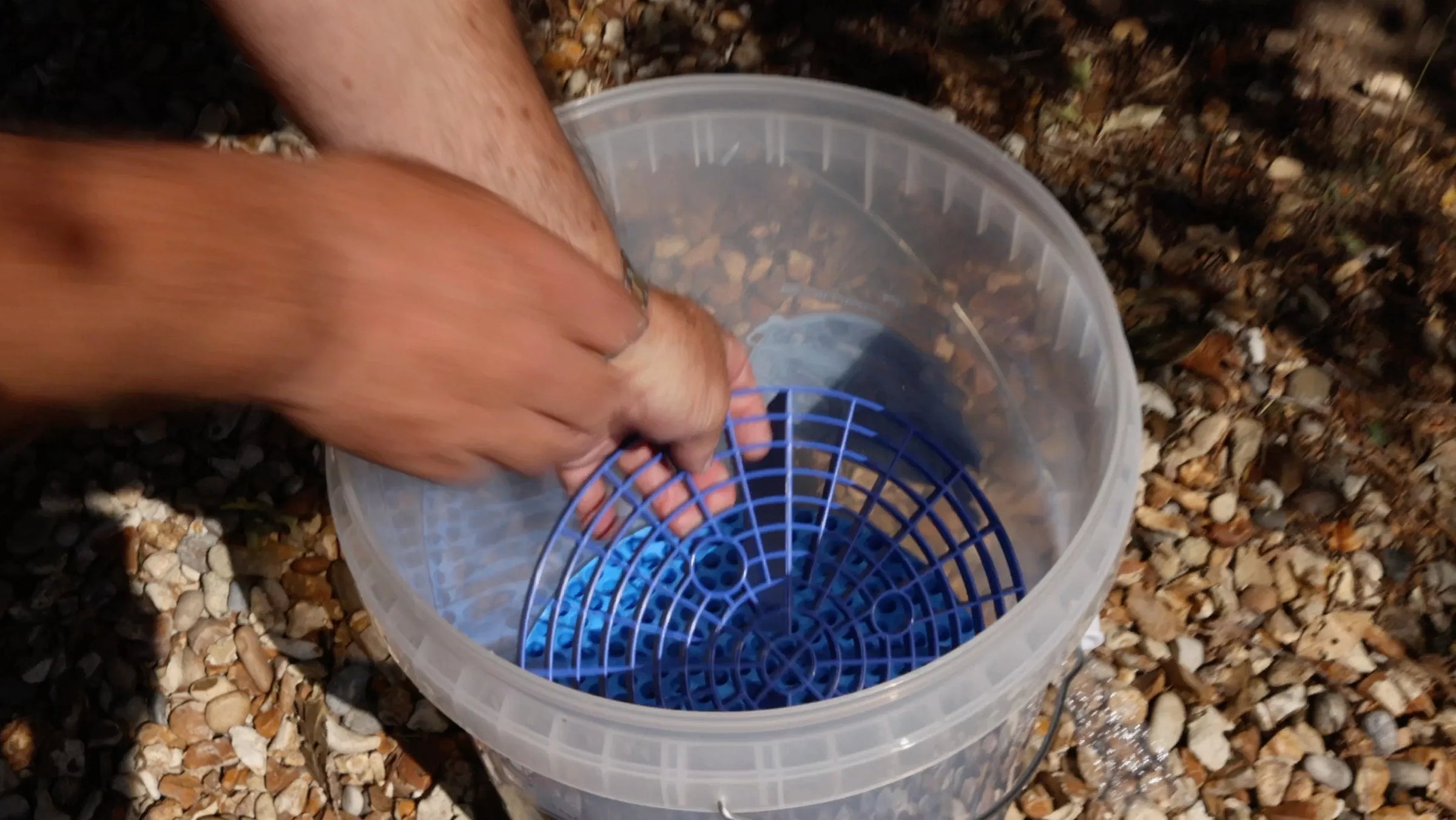 DualGuard grit guard and dirt trap in a wash bucket